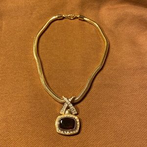 Classical Nolan Miller faux topaz necklace.